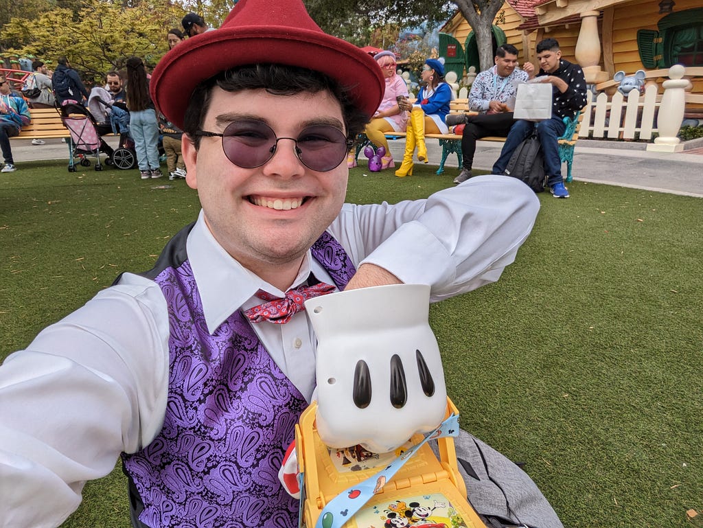 Caddy Sitting on a Picnic Green With a Basket in Mickey’s Toontown