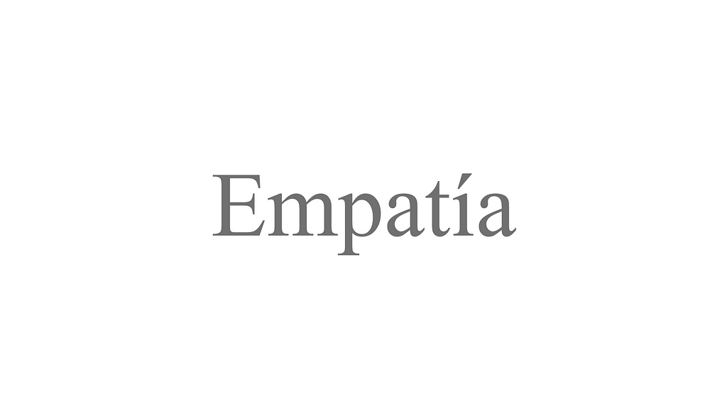 Texto de color gris sobre un fondo blanco, donde se lee la palabra “empatía” escrita en una tipografía elegante.