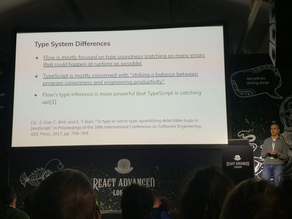 David Gomes on stage with a slide with the title ‘Type System Differences’