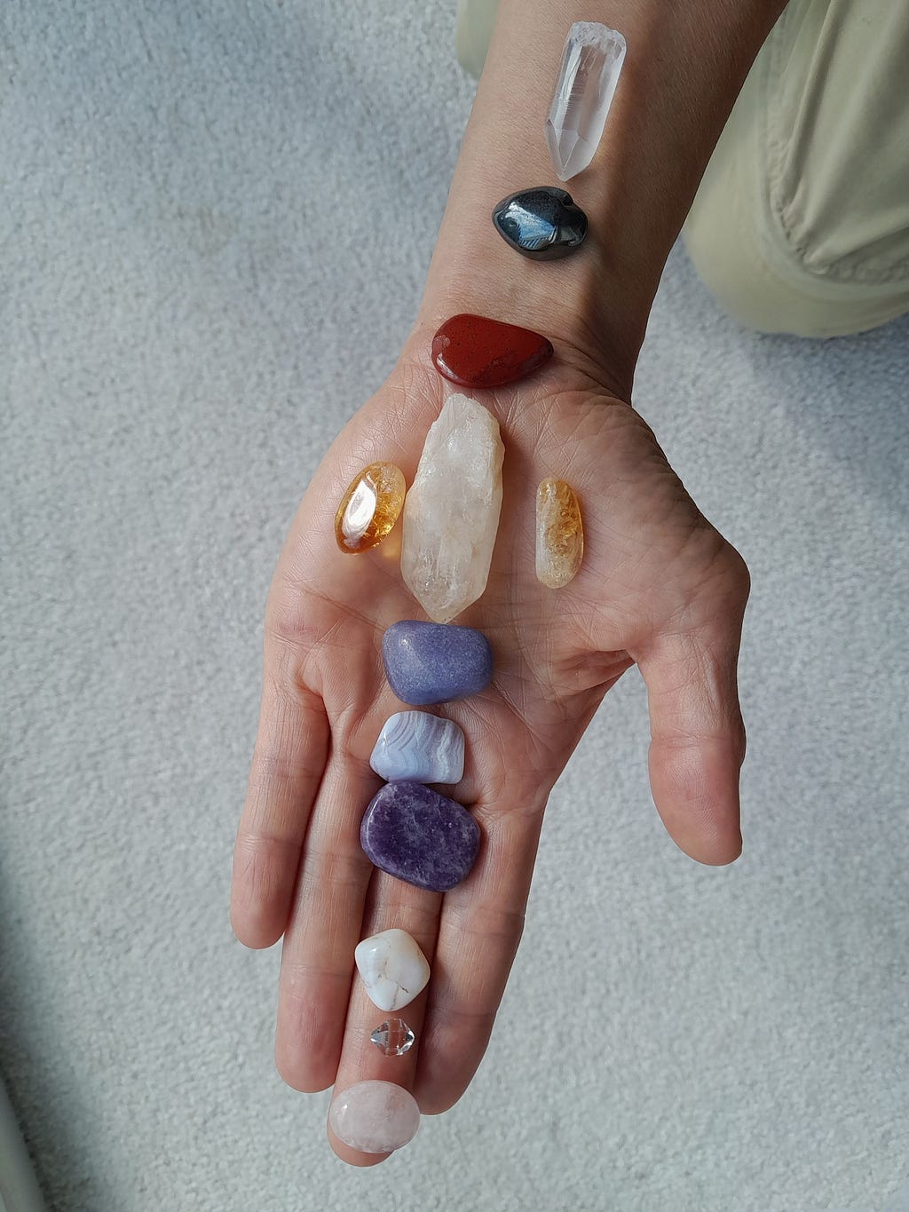 Layout of gemstones on hand