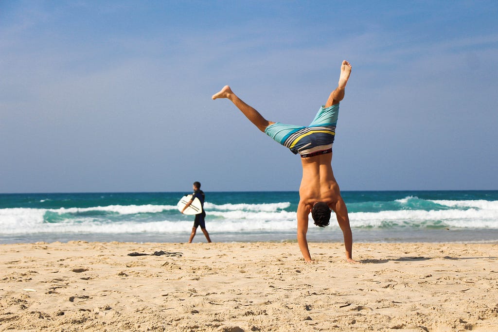 Having fun exercising at the beach