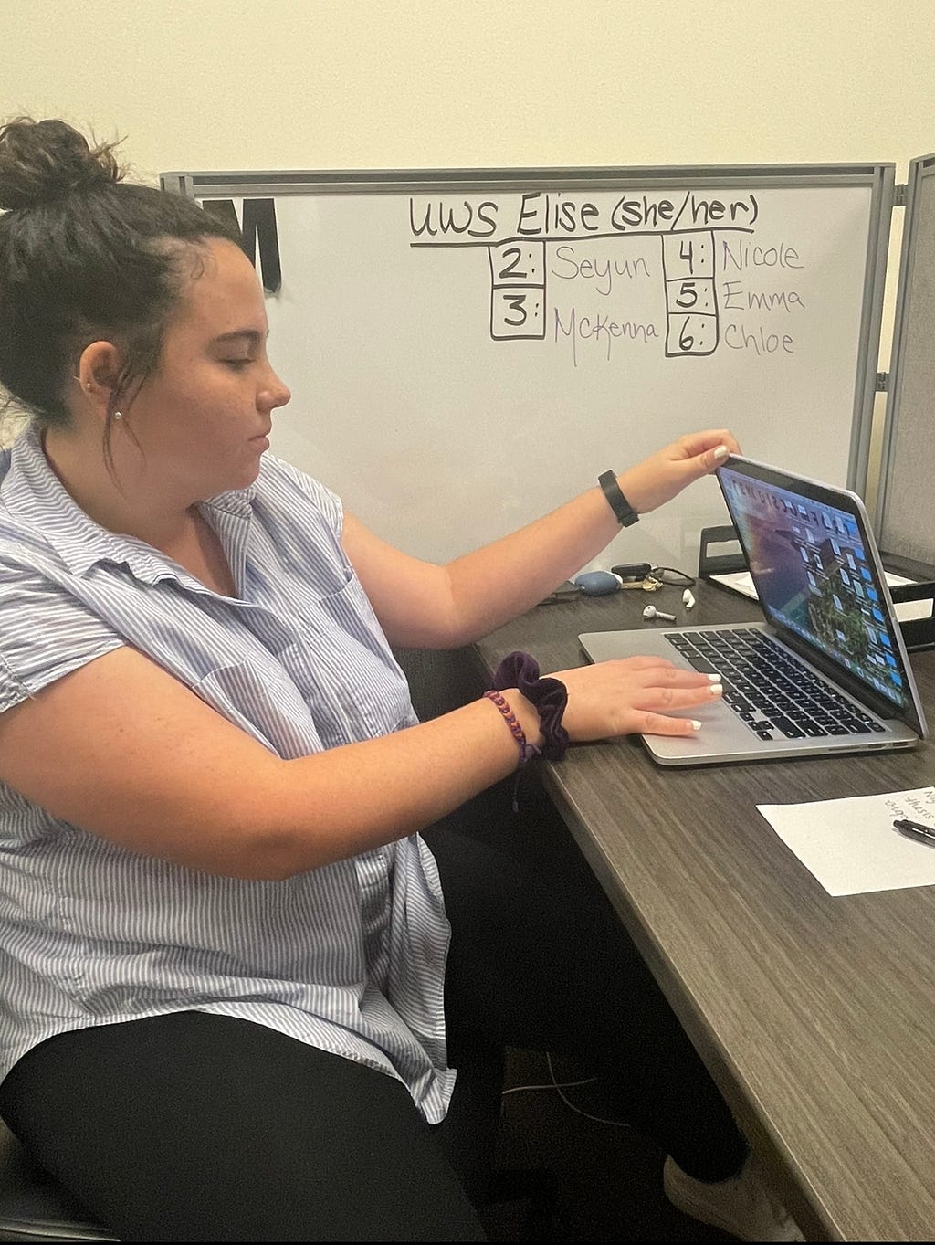 After finishing up the comments and drafting a summary email to the student, Elise Pinsonneault can shut down her computer for the day. She was able to finish her last consultation on September 25, 2022, in the Busch Student Center early and was excited to get to head back to her dorm after a long day.