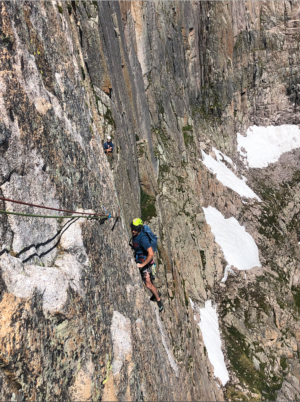Tommy Caldwell climbing pitch 3 traverse on the Casual Route (5.10a), the Diamond, Longs Peak, Colorado