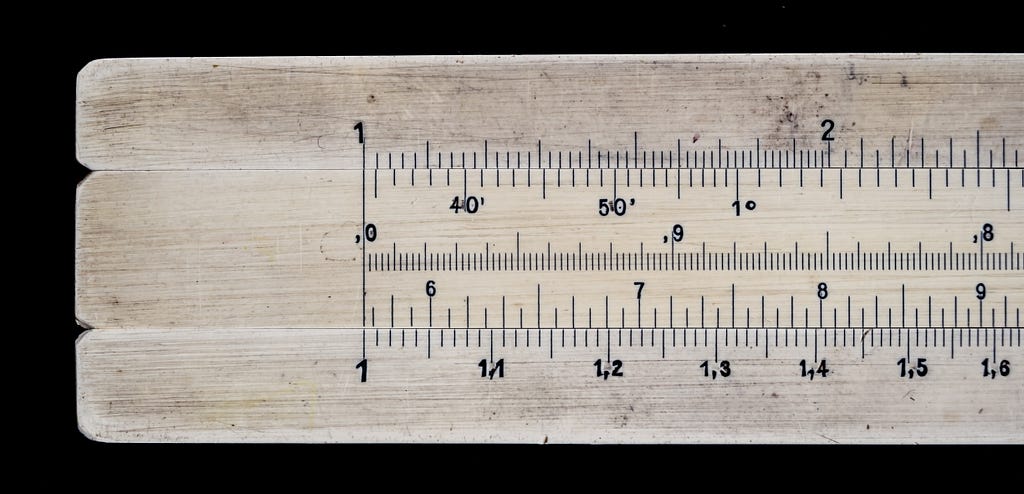 a ruler with inches on the bottom and millimeters and centimeters on the top