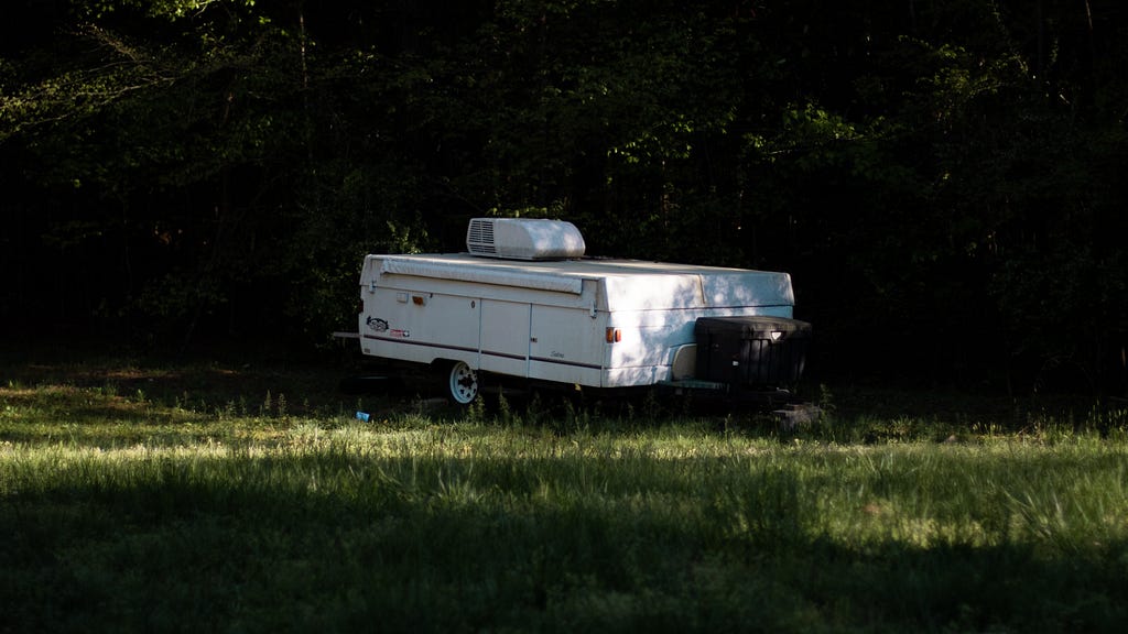 Combi-camper in the forest. Not Opened.