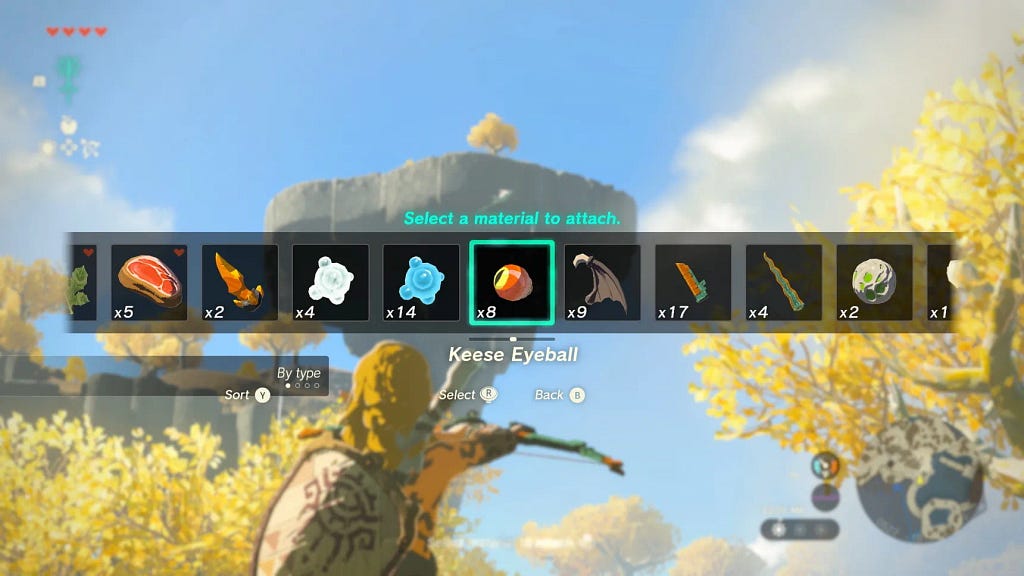 An in-game menu is shown, which contains a player’s inventory of items that can be attached to an arrow.