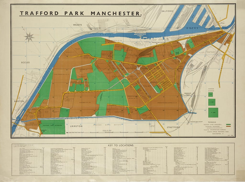 A 1936 Map of Trafford Park made up of green and orange sections, the former signalling available factory sites and the latter existing factories.