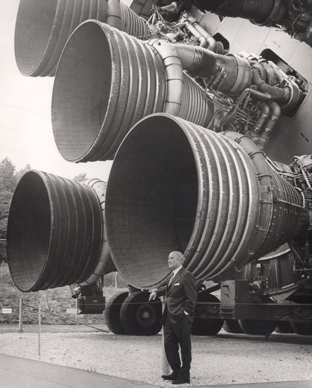 Dr. von Braun in front of the Saturn V first stage F-1 engines. (Courtesy of Marshall Space Flight Center)