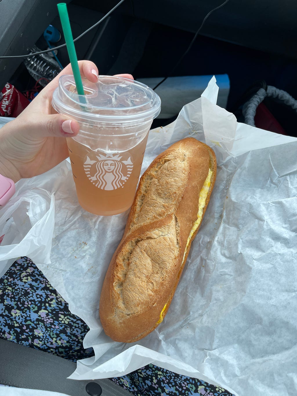 Road trip essentials, Starbucks green tea, and bánh mì