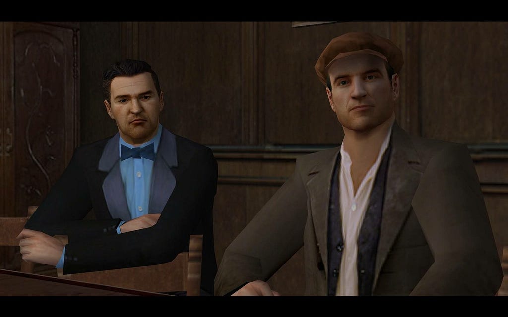 Screenshot from the 2002 Mafia game, with Thomas Angelo (Right) sitting down next to a partner (left).