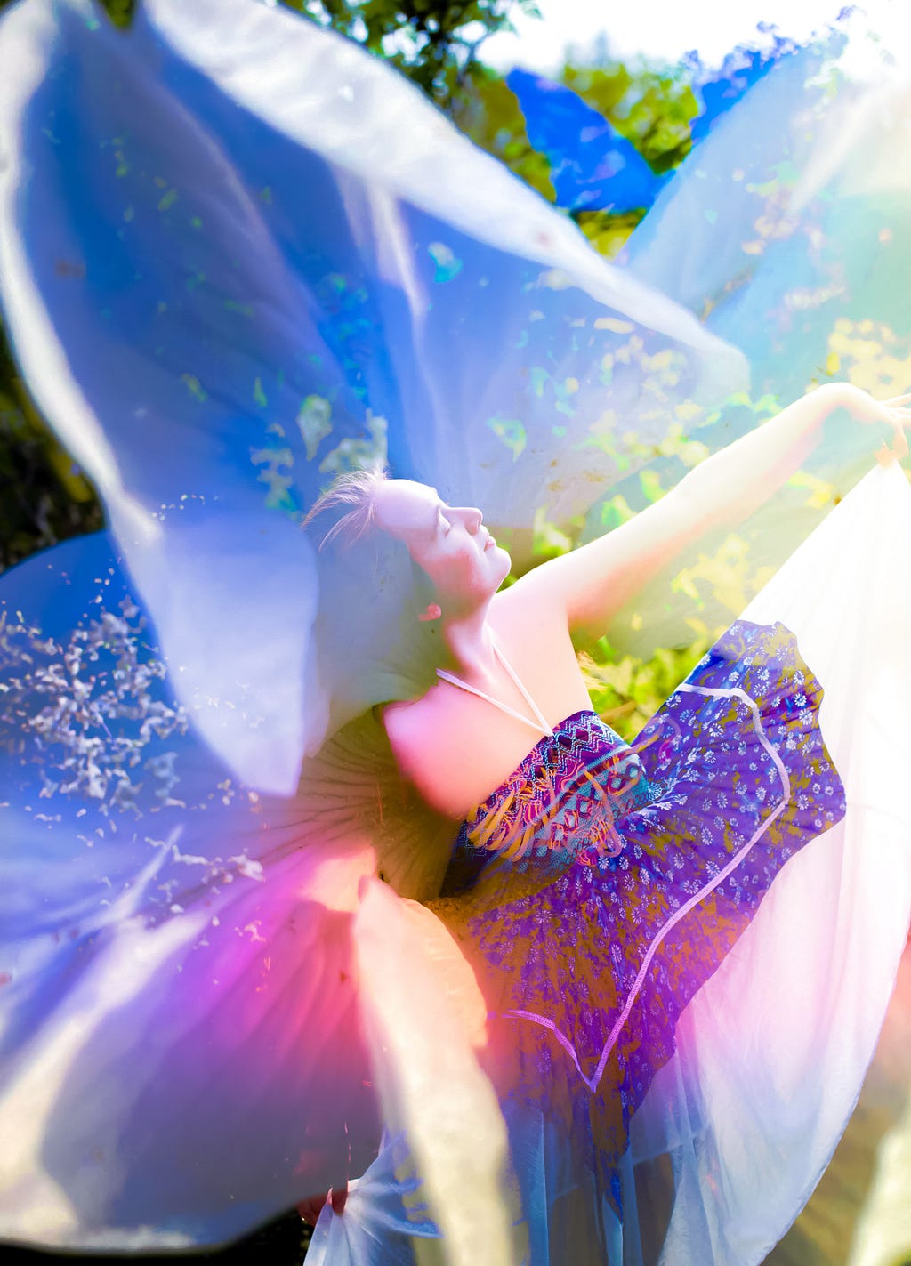 Digital artwork of a woman inside a flower. She is wearing a white and blue dress, and looks a bit like a fairy.