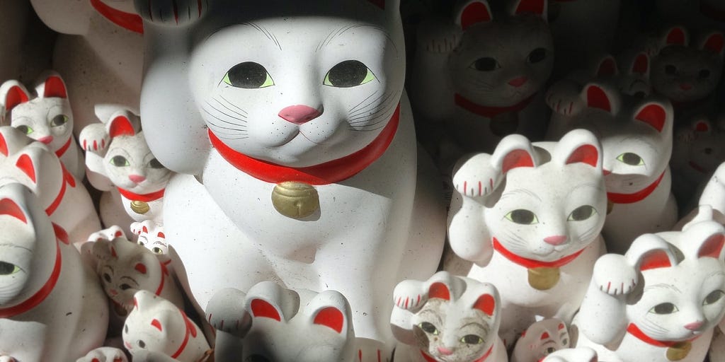 collection of Maneki Neko the lucky cat in Japanese and Chinese culture