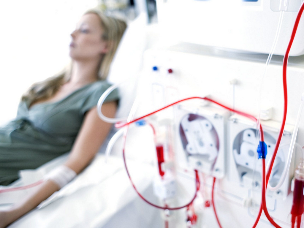 Woman taking Ozone therapy through IV