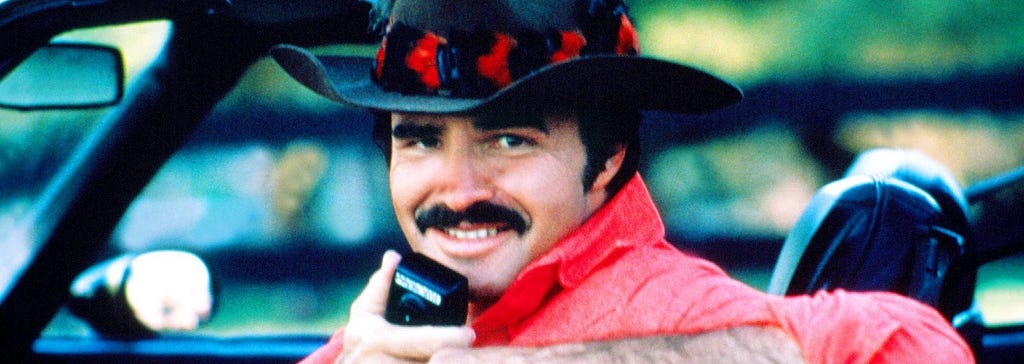 Burt Reynolds with CB mic.