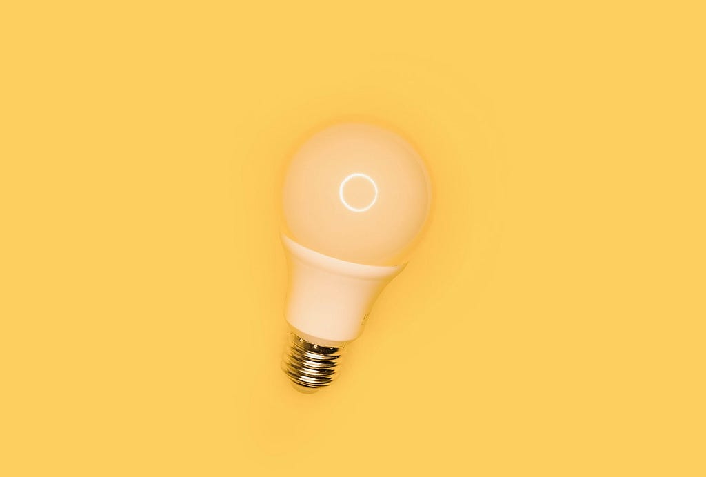 Lightbulb on a yellow background
