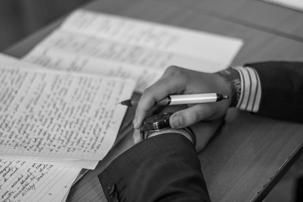 image link :https://www.pexels.com/photo/grayscale-photography-of-person-holding-pen-783737/