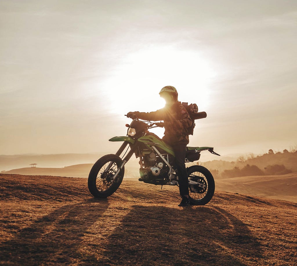 Motorcyclist — Photo by Roman Bintang on Unsplash