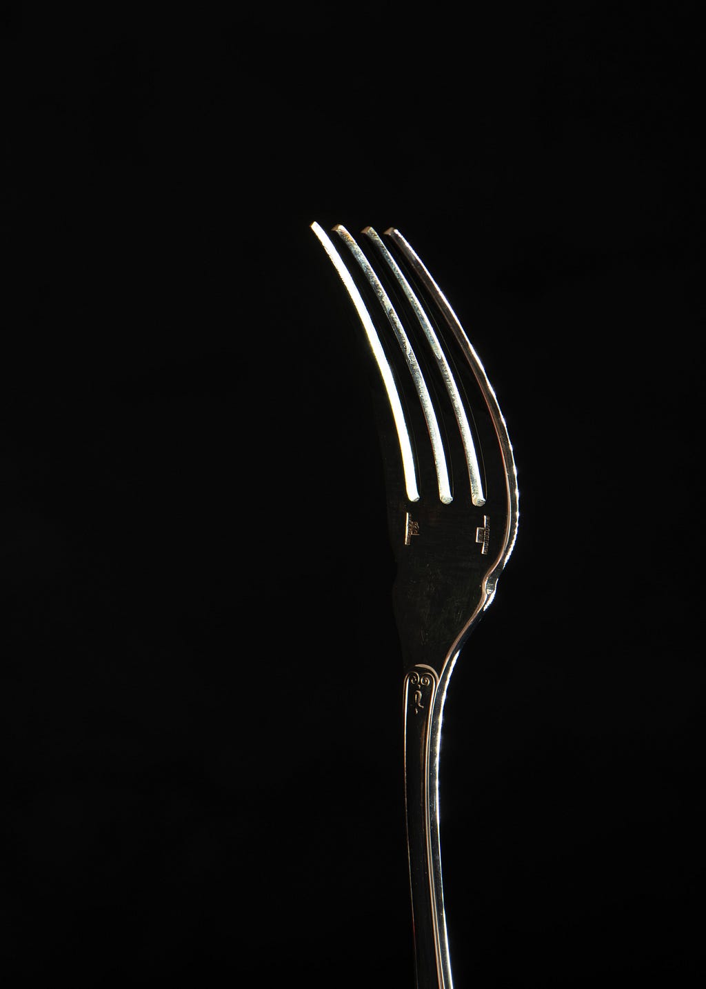 A fork is being used a visual prompt for improved conversation skills