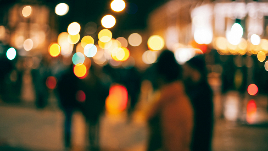 Image of blurred people on a busy street