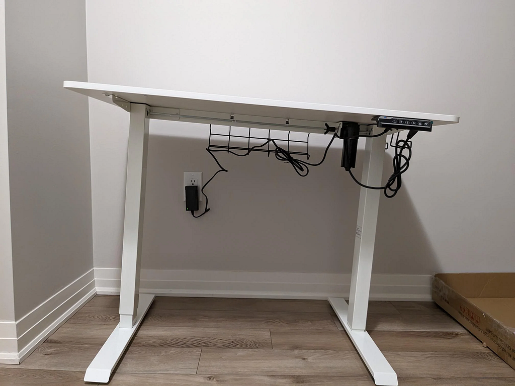 A Sit-Stand Desk With Uneven Legs