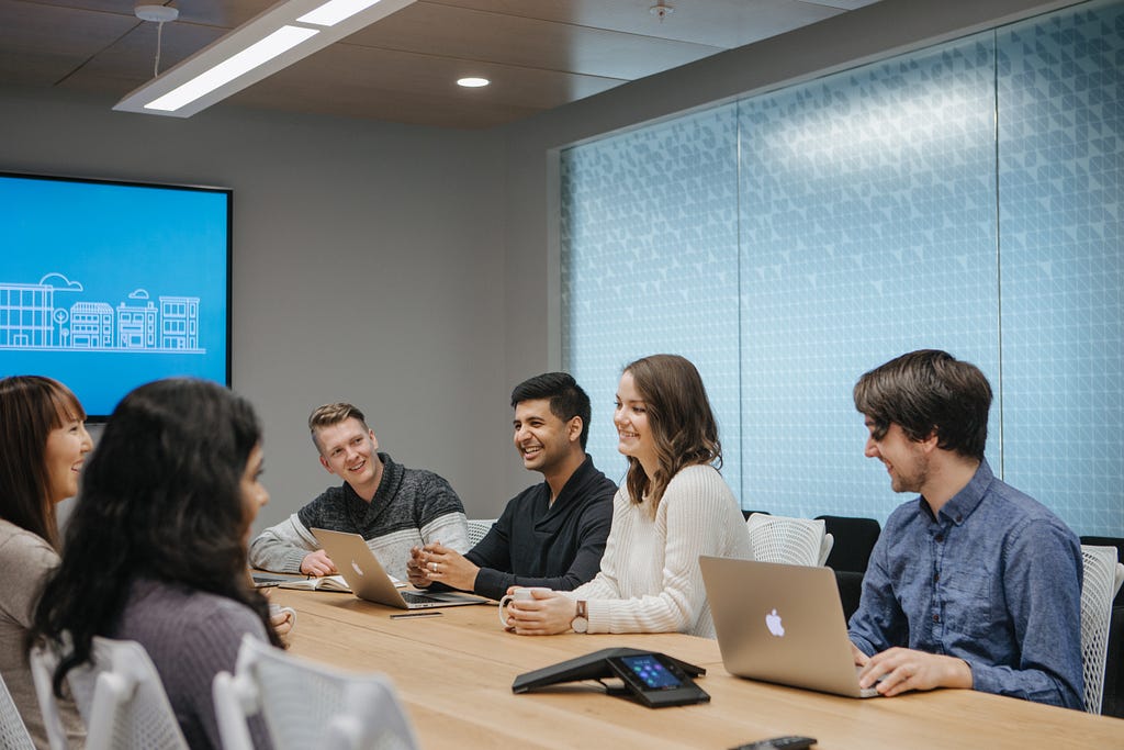 Benchmates in a Sales meeting