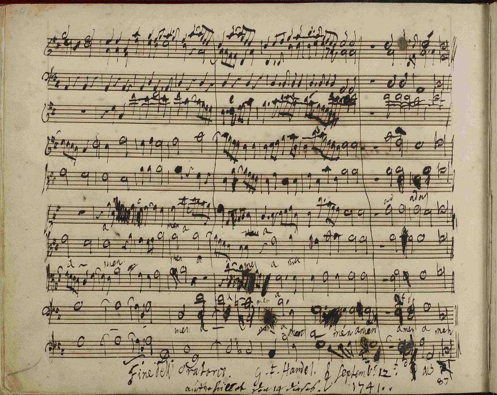 handwritten music with Handel’s signature at the bottom