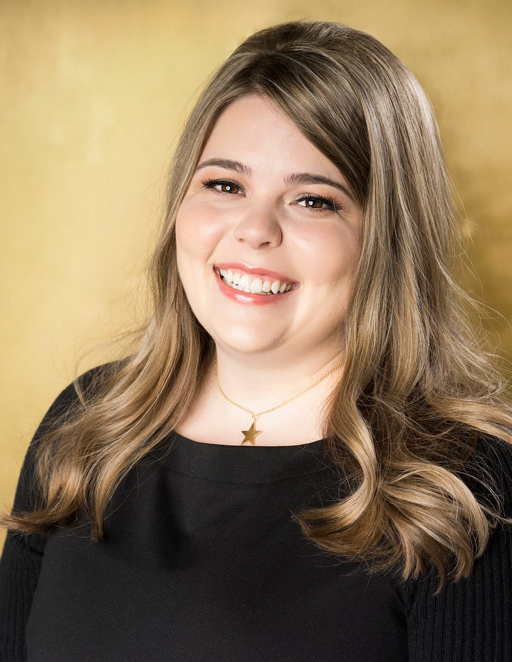 Headshot of Katie Gray.