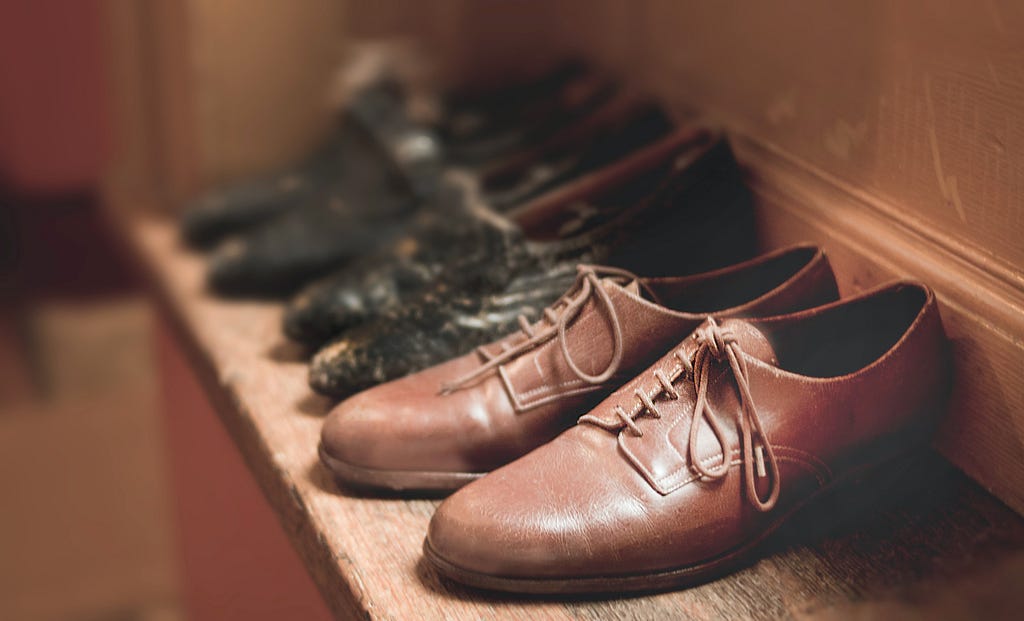 preloved shoes in a shelf