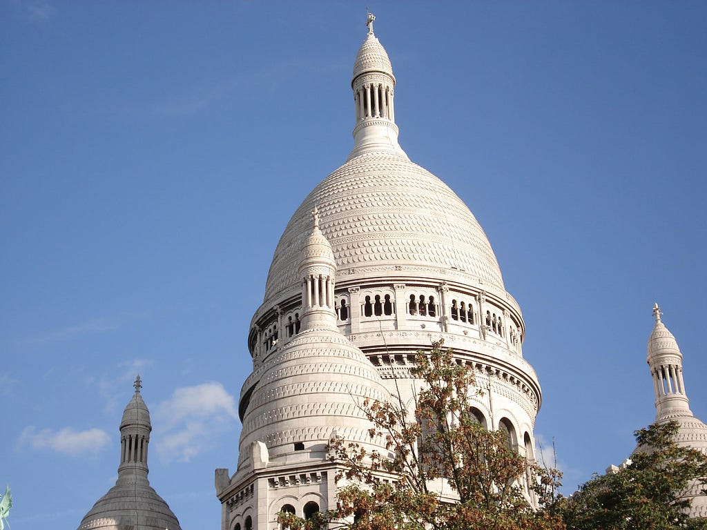 Domes of the Sacré Coeur in Paris, as an illustration for the song La Complainte de la Butte.