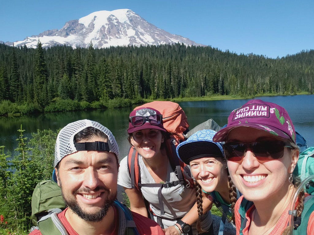 Posing in front of Mount Rainier during our 3-day trek on the Wonderland Trail.