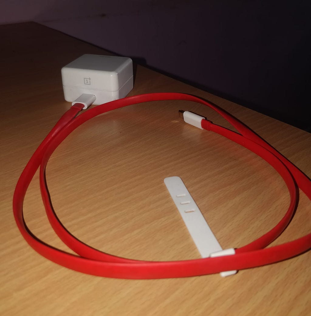 a photo of oneplus mobile charging cable.