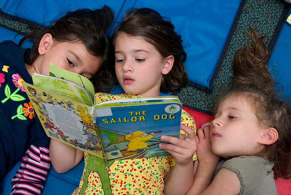 Reading during rest time in kindergarten (Judah S. Harris)