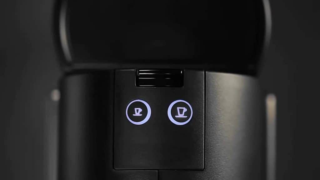 Photo of Nespresso Coffee Machine focusing on the two buttons to make coffee.