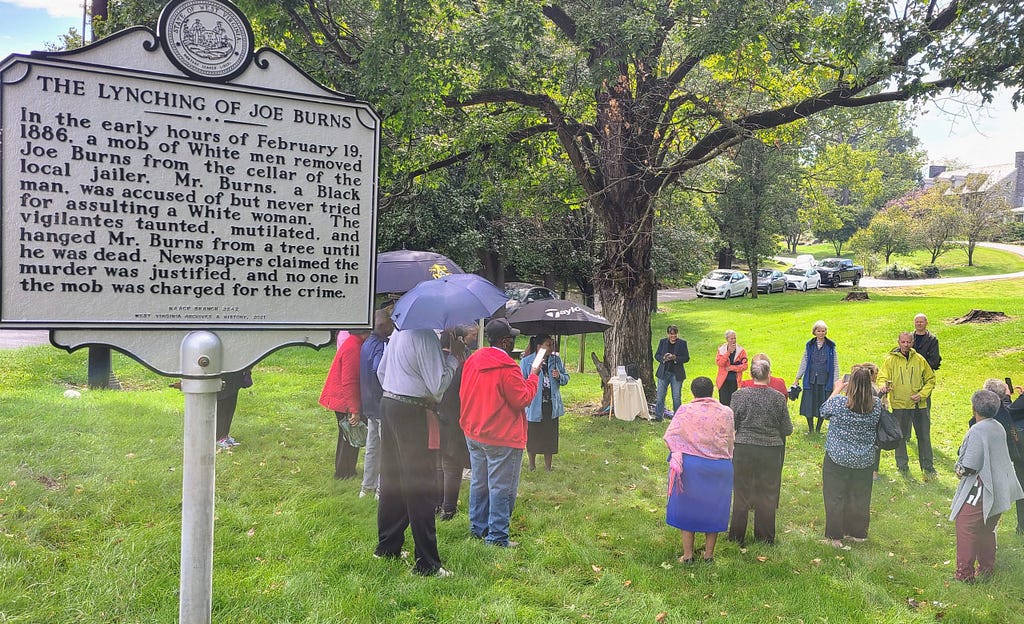 Gathering for unveiling of marker commemorating the lynching of Joe Burns in 1886
