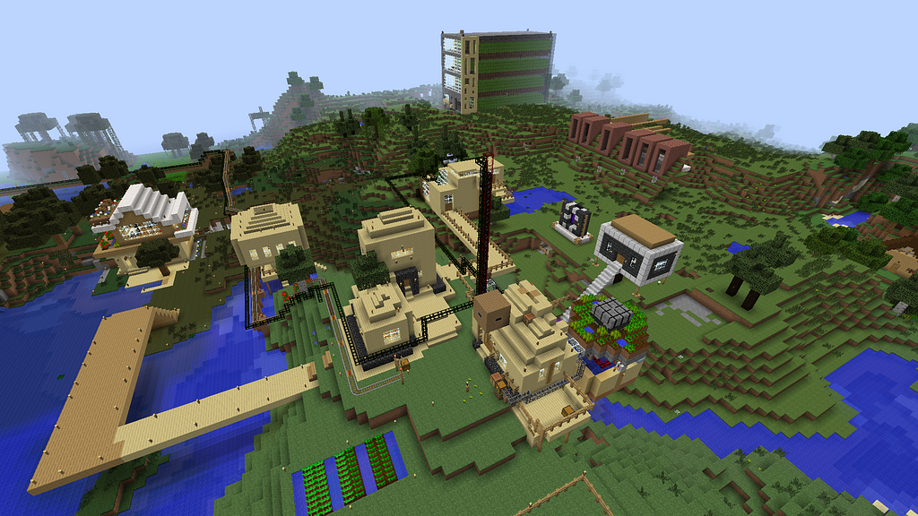 A picture of our city in Minecraft, with many large buildings and pipes full of oil passing right trough.