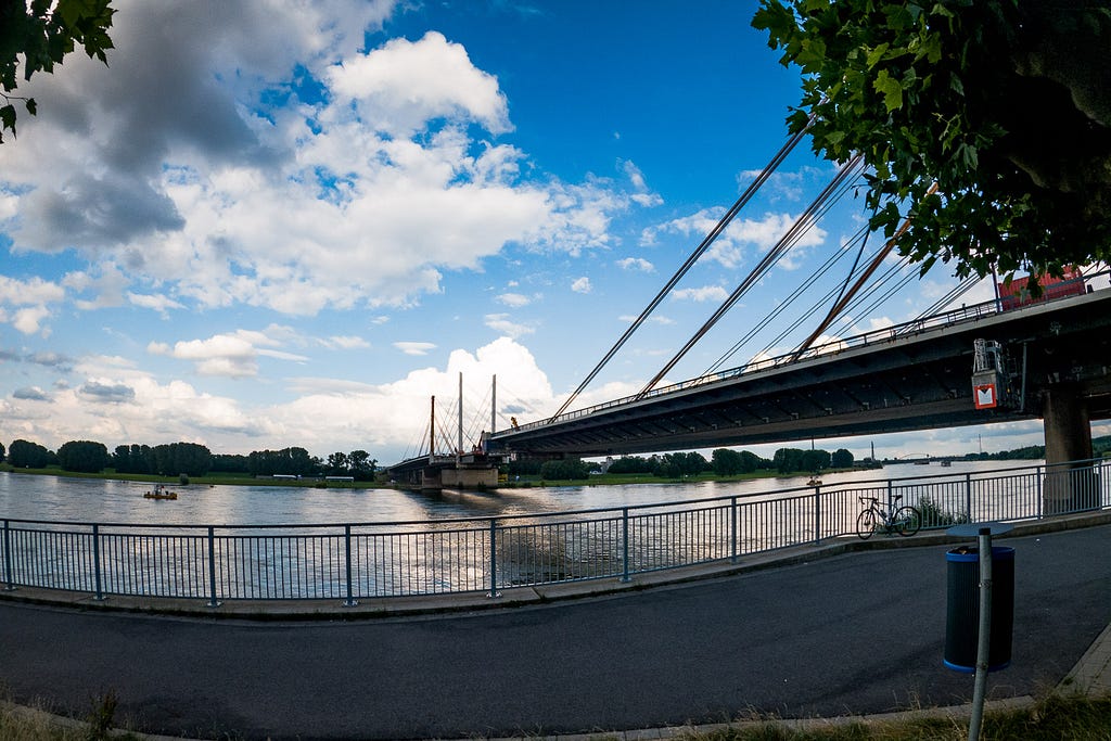 Pit stop with a view during an early evening ride, which I described as “my happy place for the day.” Duisburg, Germany, 10 July 2024.