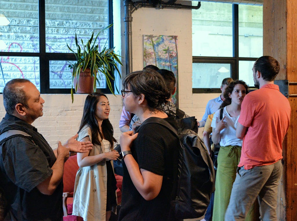 Attendees discussing with one another after our ‘Data, Policy-Making and City-Building’ public salon.