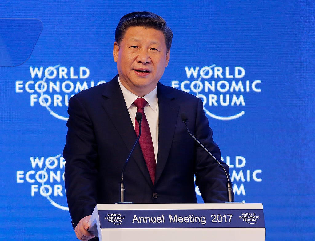 Hasil gambar untuk Xi Jinping rebuked Donald Trump, positioning himself as champion of globalization