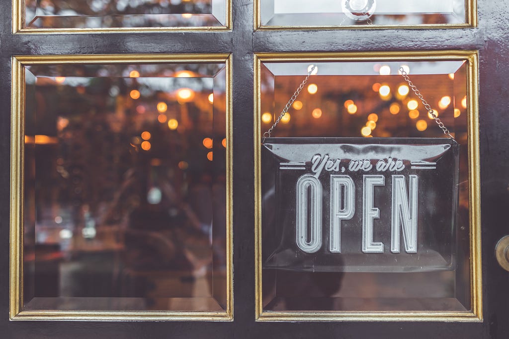 Open signage on door