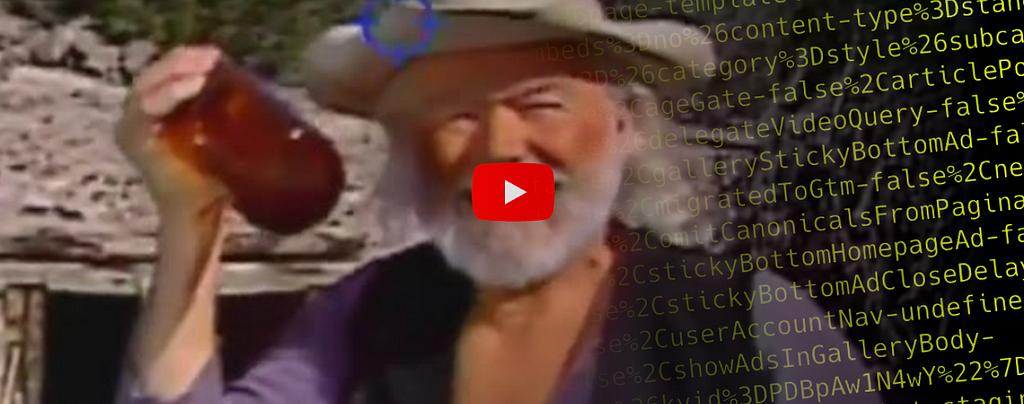 A YouTube embed of a man holding a bottle. There is HTML code over the top of the embed.