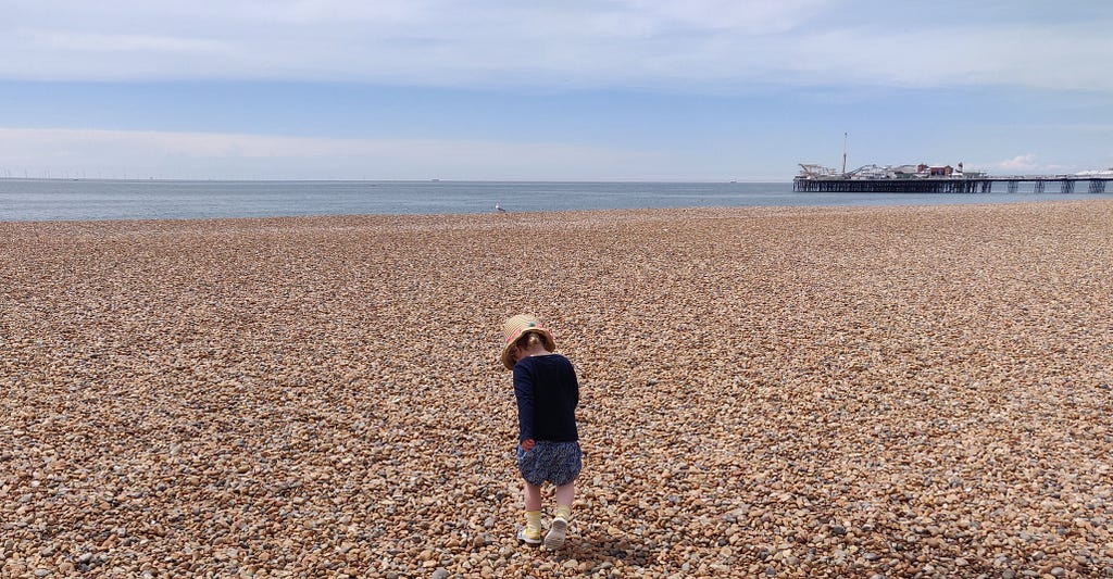 Our child on a deserted Brighton beach in June 2020