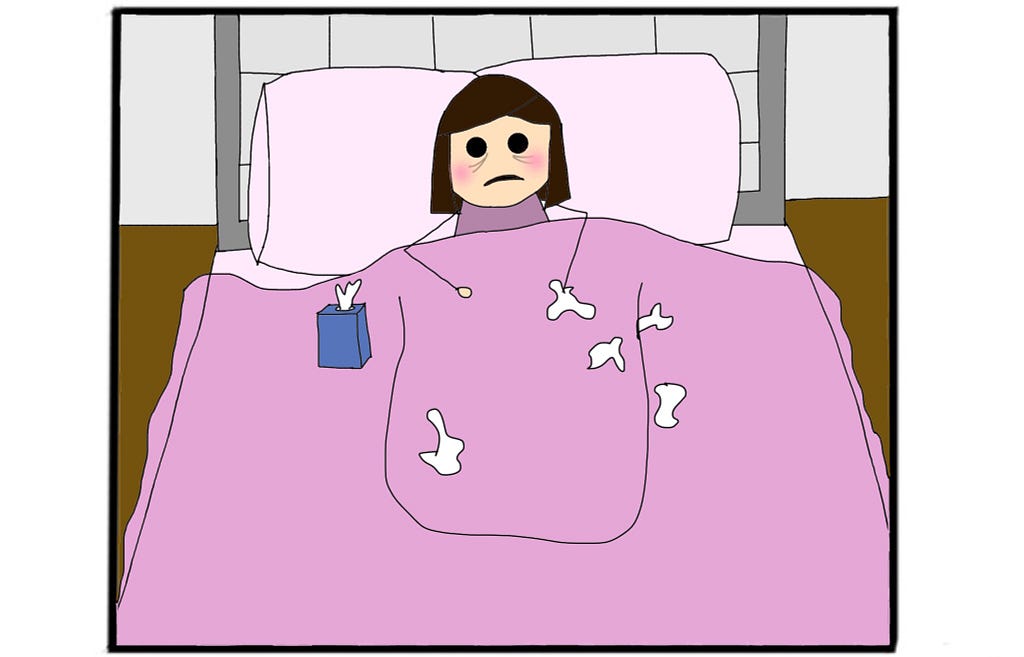 Sick person lying in bed, surrounded by tissues