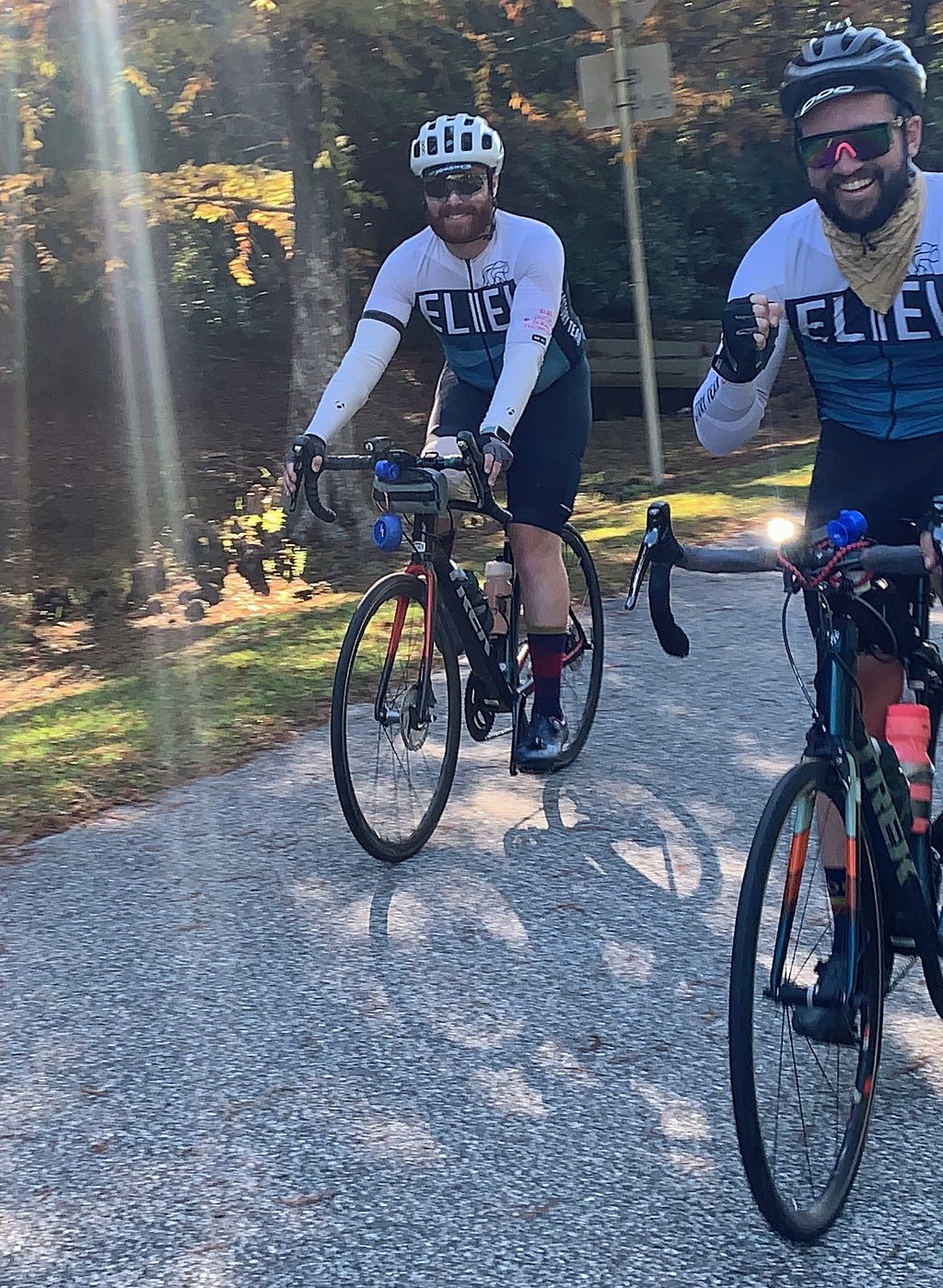 Two men bicycling