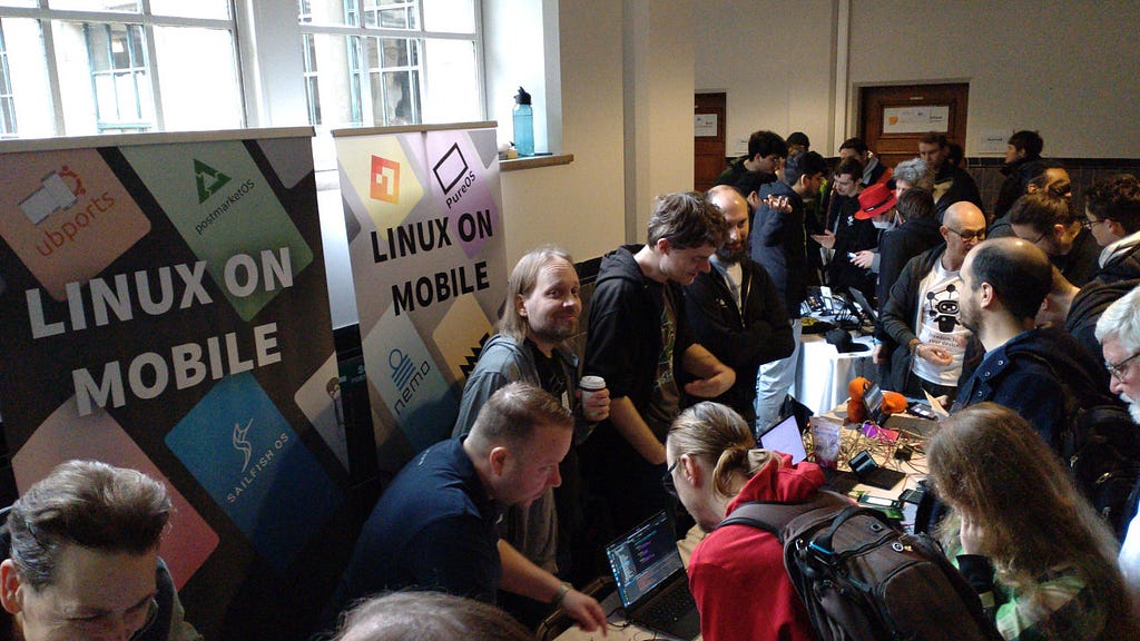 Fosdem community engaging with stands