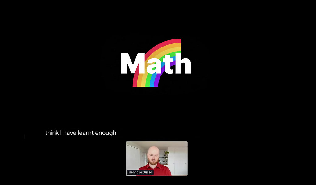 Henrique Gusso presenting his talk; Slide shows the word “Math” over a rainbow
