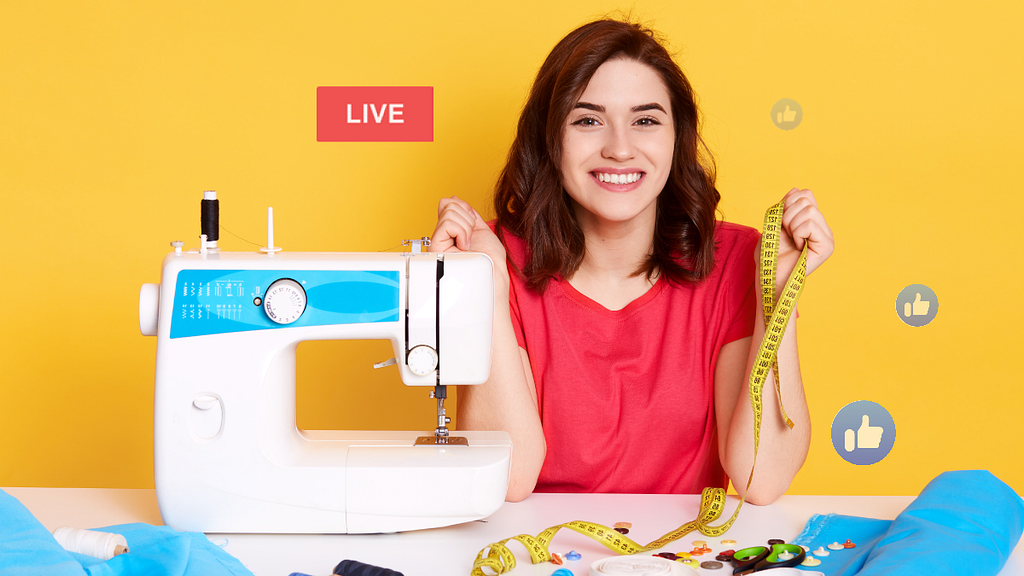 Smiling woman goes live on Facebook as she measures fabric for her quilting craft project.
