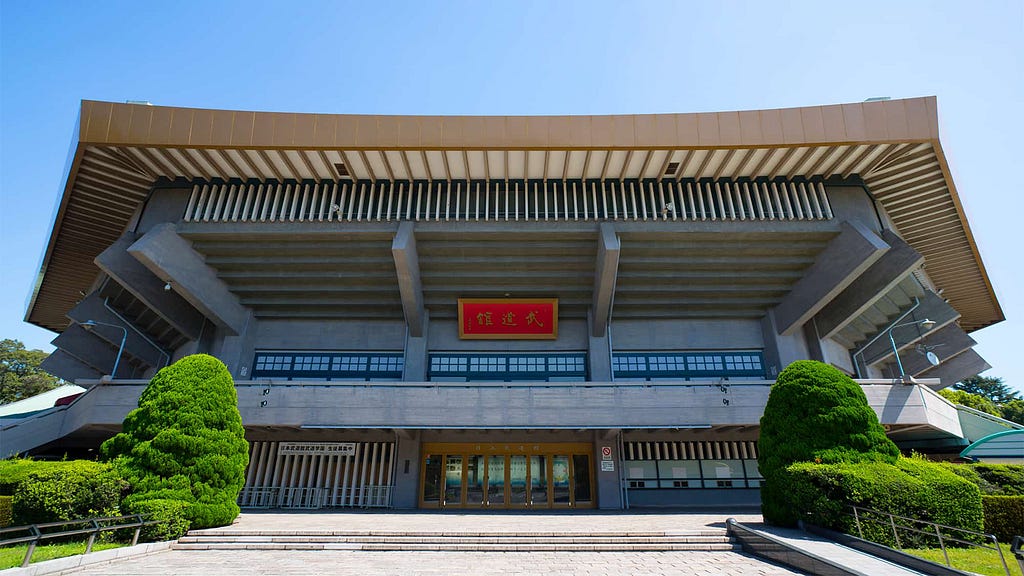 Nippon Budokan; large, eight-sided concrete building shaped like a temple.