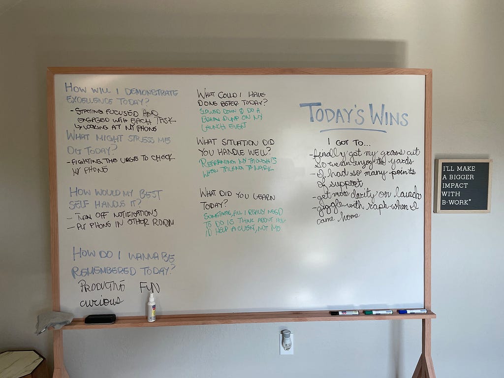 This is Tawny’s whiteboard, where she writes her daily intentions every morning and evening. It also includes her wins for each day.
