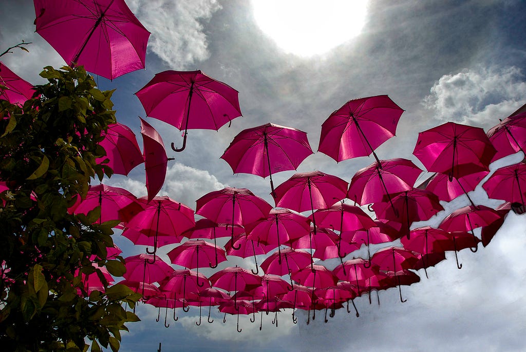 umbrellas floating in the sky