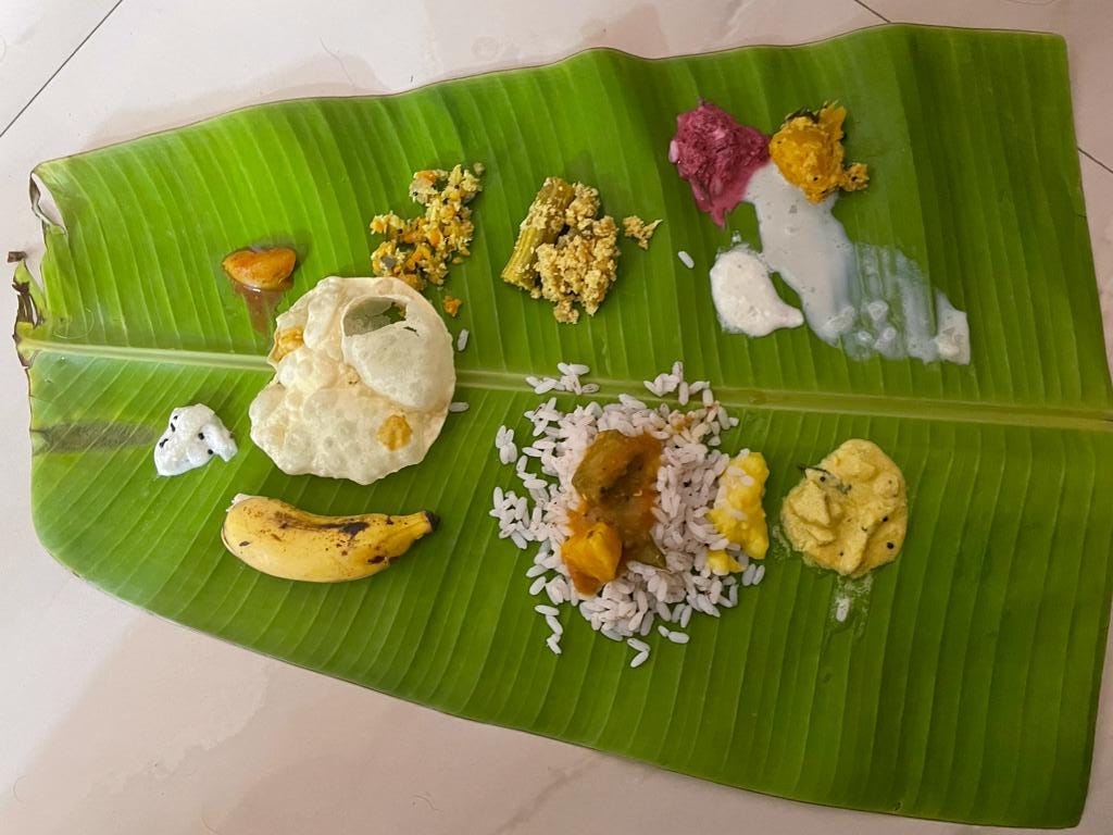 Traditional Kerala feast served on a banana leaf